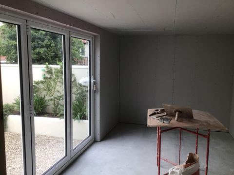 Converted garage with bifold doors to the garden