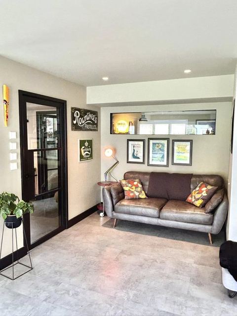 Bright flexible room created from a garage conversion